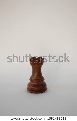 A chess tower on a white background