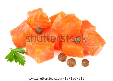 Red fish. Raw salmon fillet with parsley and peppercorns isolate on white background