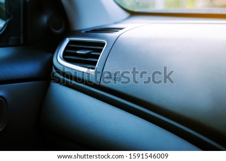 Air bag logo on dashboard in new modern car, Close up