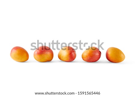 Food photography of group of mangoes on a white background