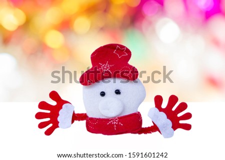 cute Santa Claus made from cloth handmade on colorful light bokeh background