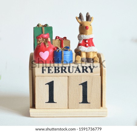 February 11, Icon, Christmas, Birthday with number cube design for background.