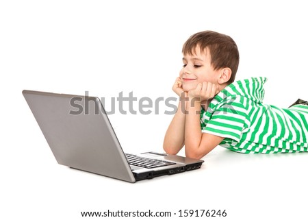 Boy holding a laptop isolated on white background