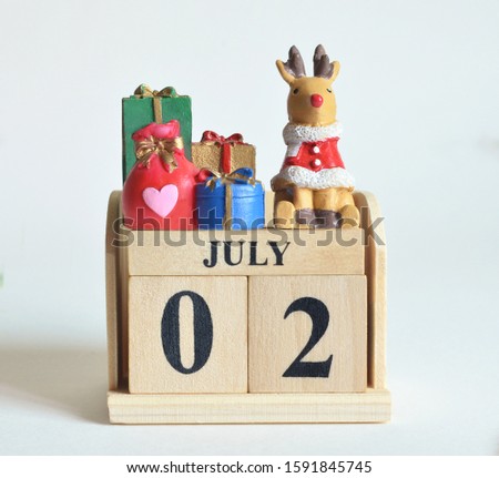 July 2, Icon, Christmas, Birthday with number cube design for background.