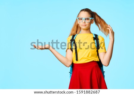 Schoolgirl glasses yellow T-shirt Red skirt