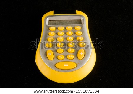 Close-up of calculator Object on a black Background
