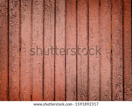 The background of old brown painted wooden Board 