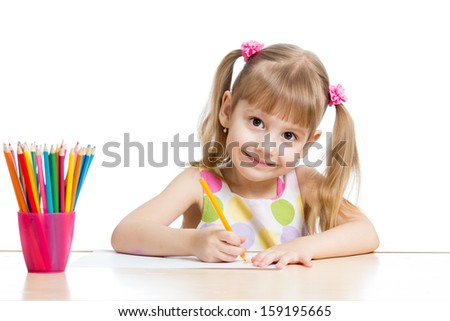 child girl drawing with colourful pencils