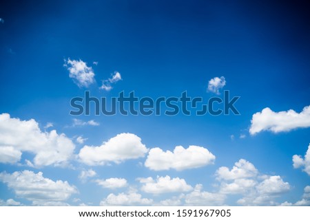 clouds and blue sunny sky,  white clouds over blue sky, Aerial view,  nature blue sky white cleat weather. Royalty-Free Stock Photo #1591967905