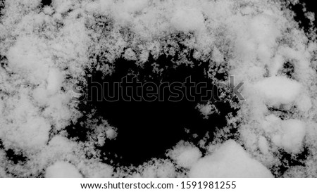 snow frame for photo or design space for text or other isolated black