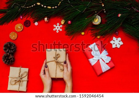 women's hands Christmas background Christmas tree gifts new year holiday decorations