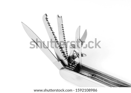silver folding multifunction knife on white background