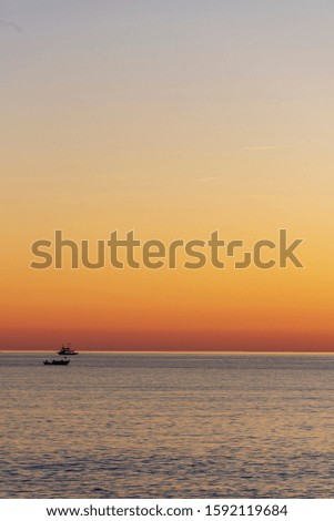 Turkey, Antalya drawn around sunset, campers and fishermen photos.