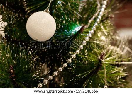 Beautiful Christmas tree with garlands and decorations