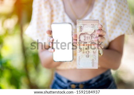 Close-up photos and bank cards used for business and currency exchange purchases. Hand and money concept
