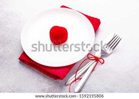 Valentines day table place setting with red velvet ring box and silverware on stone background. Valentine's card - Image