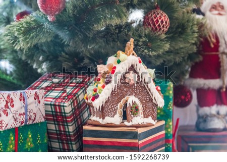 Gingerbread house and a snowman from marshmollow - homemade Christmas cookies