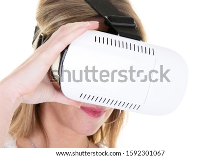 woman in goggles mask experiencing virtual reality vr as new entertainment device 