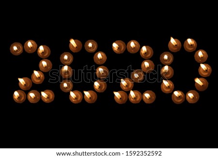 2020 Written with Burning Candles, Creative Image of Happy New Year 2020, Perfect for Wallpaper