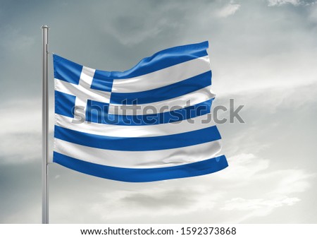 Greece national flag cloth fabric waving on beautiful grey sky.