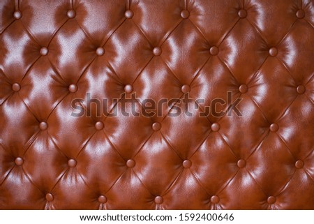 Brown upholstery pattern. horizontal elegant leather texture with buttons for pattern