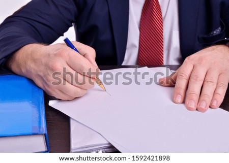 Men's hands sign documents of contracts, business, success, prosperity, power