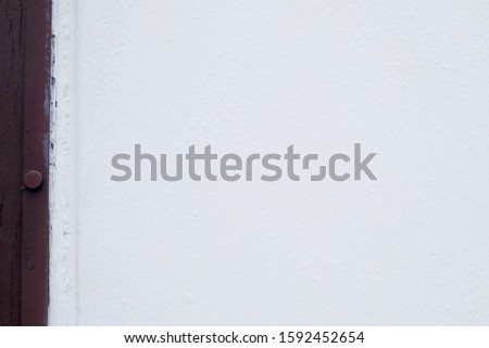 Background Pattern, White Concrete Wall Texture with Brown Wooden Frame. Copy Space for Text Decorated.