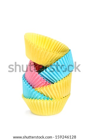 colored cupcake holders stacked