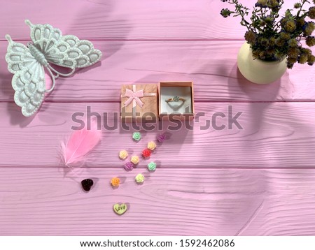 Love letter, ring for proposal. Still life with place for text, for Valentine's Day.