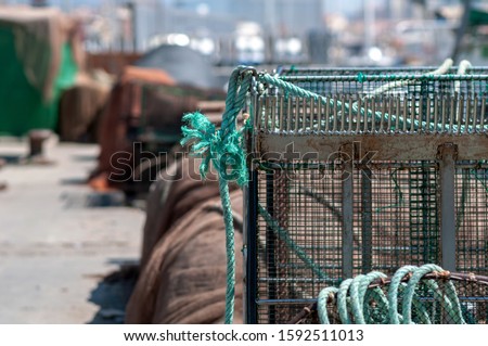 cage with rope to keep octopus