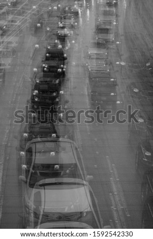 FEBRUARY 2, 2019 - LOS ANGELES, CA, USA - Abstract and impressionistic Traffic Congestion in a rain storm on the 110 CA Freeway, the Harbor Freeway through downtown Los Angeles