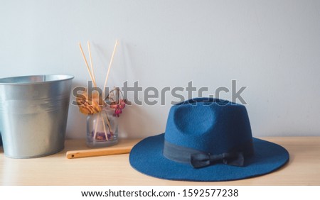 Hats and vases on wooden floors