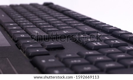 black keyboard for messaging and writing text on a computer.