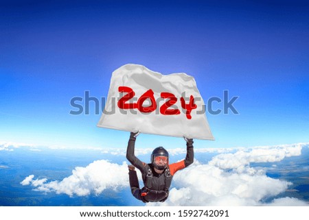 2024. Men in parachute equipment in free fall. Skydiving sport. Extreme hobby as a way of life. Parachuting. 