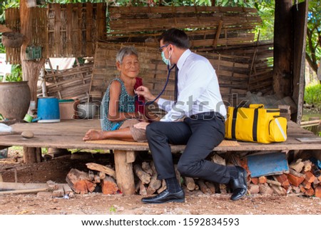 The doctor examined the patient's heart,Community Health and Development Hospital In Remote Areas Development Fund Concept. Royalty-Free Stock Photo #1592834593