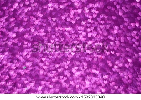 the concept of Valentine's day,purple hearts bokeh as background