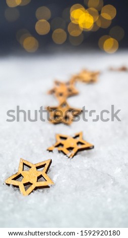 Christmas stars on snow with a starry sky