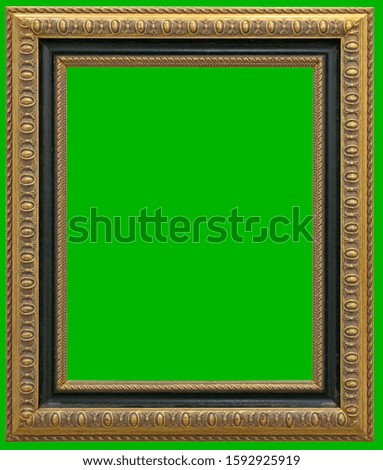 Antique gilt picture frame isolated on green background and clipping path.