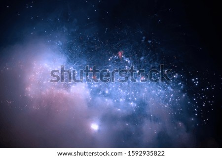 Magic golden holiday abstract background of sparkling fireworks. Christmas and New Year concept.