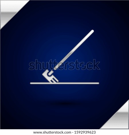 Silver Garden rake in work icon isolated on dark blue background. Tool for horticulture, agriculture, farming. Ground cultivator.  