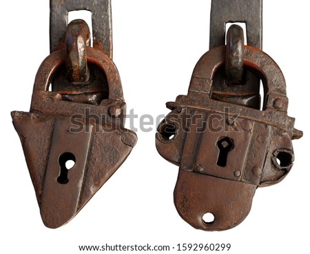 Close-up of two ancient rusty padlocks with keyhole isolated on white background