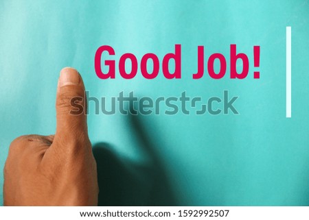Thumb up sign for job that successfully done.