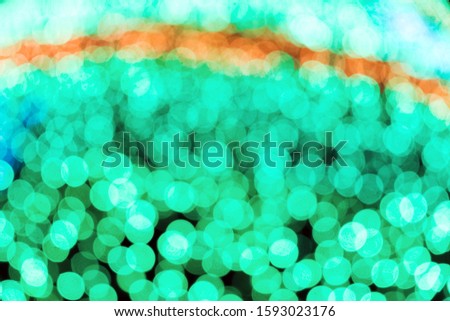 Festive party background with blurred lights. Bokeh effect, abstract defocused backdrop