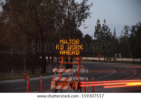Road warning sign with message/Traffic Warning/Lighted sign warn of construction and danger