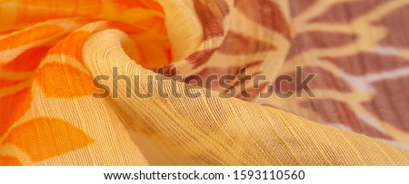 Texture, background, pattern, sensations, orange red yellow floral, A foulard is a lightweight fabric, either twill or plain-woven, made of silk or a mix of silk and cotton. 
