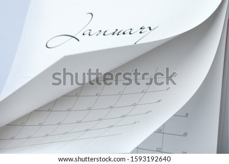Closeup view of white paper office calendar