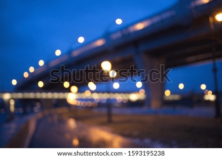Blurry city lights in winter evening