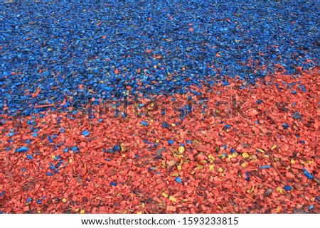 Small pieces of wood are blue and red. Moscow. Russia.