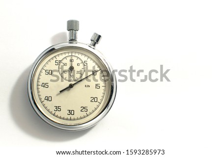 Mechanical stopwatch in a metal case on a white background. Royalty-Free Stock Photo #1593285973