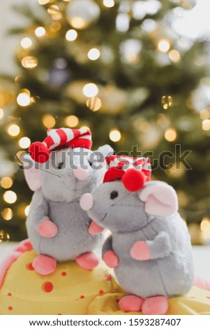 Little mouse toy, symbol of 2020. new year decoration. New Year 2020 Symbol. Greeting Christmas card. Front view. Selective focus.